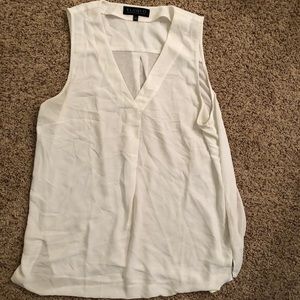 White sleeveless blouse